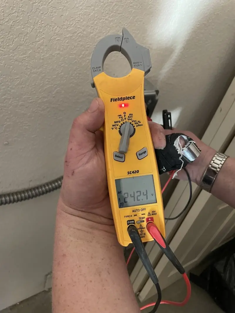 Voltage testing with clamp meter during Aluminum Wiring Replacement in Haverhill